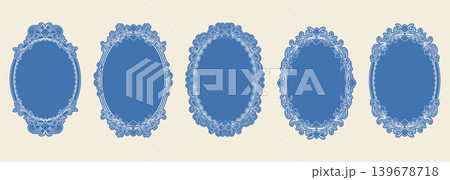 Set of vintage ornamental oval frames with intricate classical patterns in blue and white Set of vintage ornamental oval frames with intricate classical patterns in blue and white 139678718