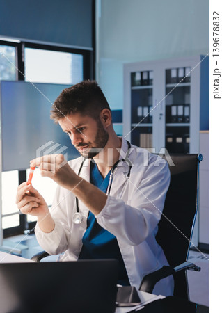 Attractive student of chemistry working in laboratory 139678832
