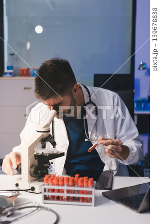 Attractive student of chemistry working in laboratory 139678838