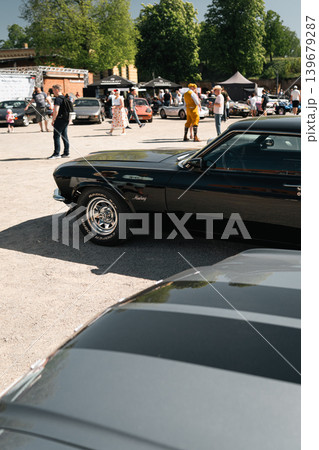 Berlin, Germany - May 2, 2026: Black Ford Mustang at Classic Car Event Berlin, Germany - May 2, 2026: Black Ford Mustang at Classic Car Event 139679287