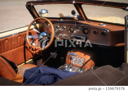 Berlin, Germany - May 2, 2026: Yellow Vintage Convertible Interior Berlin, Germany - May 2, 2026: Yellow Vintage Convertible Interior 139679376