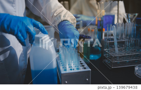 Researchers working in the clinical laboratory Researchers working in the clinical laboratory 139679438