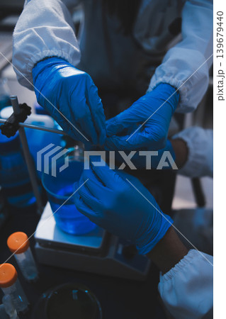 Researchers working in the clinical laboratory 139679440
