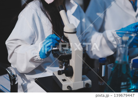 Researchers working in the clinical laboratory Researchers working in the clinical laboratory 139679447