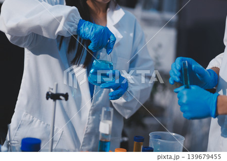 Researchers working in the clinical laboratory 139679455