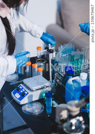 Researchers working in the clinical laboratory Researchers working in the clinical laboratory 139679467