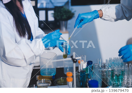 Researchers working in the clinical laboratory Researchers working in the clinical laboratory 139679470