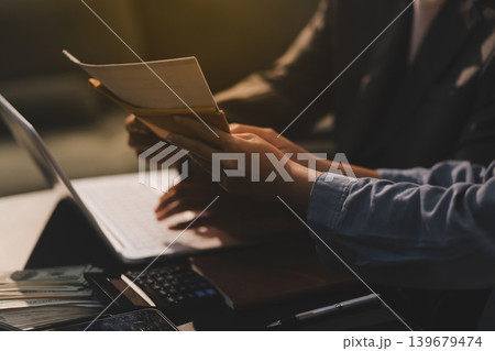 Lawyer explained to the client about the law that must be brought against the court case. Lawyer explained to the client about the law that must be brought against the court case. 139679474