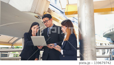Business Partner using digital tablet online meeting team Partnership businessman, businesswoman talking together. Diversity Asian Business Partner online meeting trust teamwork. Asian Business team 139679742
