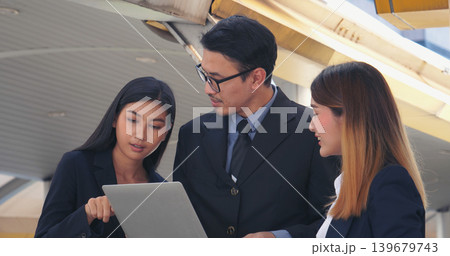 Business Partner using digital tablet online meeting team Partnership businessman, businesswoman talking together. Diversity Asian Business Partner online meeting trust teamwork. Asian Business team 139679743