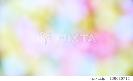 Colorful lights create a soft blur in a background setting during an evening event in a decorated space Colorful lights create a soft blur in a background setting during an evening event in a decorated space 139680716