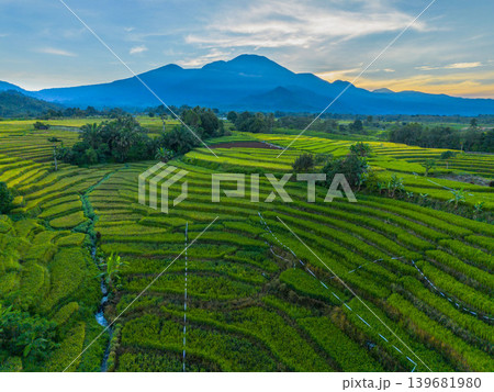 The natural beauty of the Indonesian mountains with beautiful tropical forests at sunrise The natural beauty of the Indonesian mountains with beautiful tropical forests at sunrise 139681980