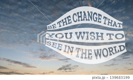 A famous quote, Be the change that you wish to see in the world, displayed against a serene sky at dusk or dawn, encouraging personal action for global impact. A famous quote, Be the change that you wish to see in the world, displayed against a serene sky at dusk or dawn, encouraging personal action for global impact. 139683199