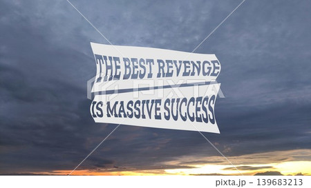 An inspiring quote on revenge. The best revenge is massive success, displayed against a dramatic sky. 139683213