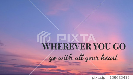 Wherever you go, go with all your heart - a powerful quote set against a beautiful sunrise or sunset sky, inspiring dedication and passion in every endeavor. 139683453