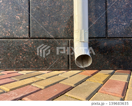 Drainpipe on the wall Drainpipe on the wall 139683635