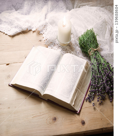 A bouquet of lavender near an open bible A bouquet of lavender near an open bible 139688684
