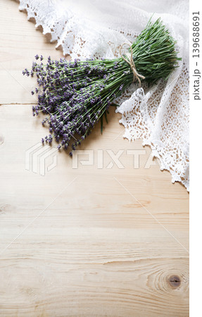Lavender flowers lie on the table on lace 139688691