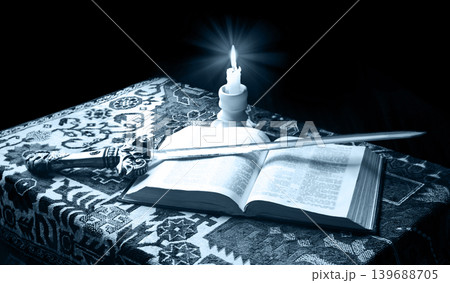 An old sword on the bible 139688705