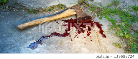 Irone axe lies on the ground 139688724