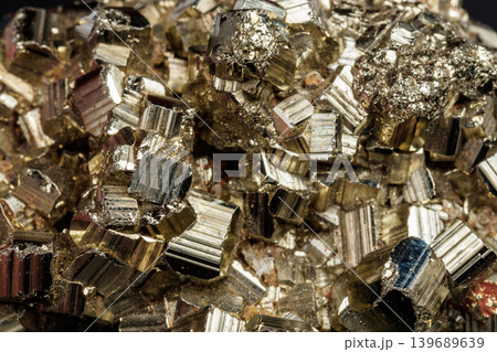 Macro mineral stone Pyrite on a black background 139689639