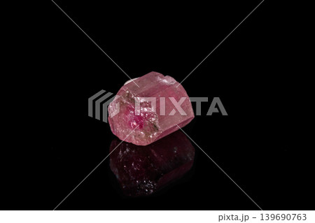 macro mineral tourmaline stone on black background macro mineral tourmaline stone on black background 139690763