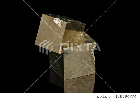 Macro mineral stone Pyrite on a black background 139690774