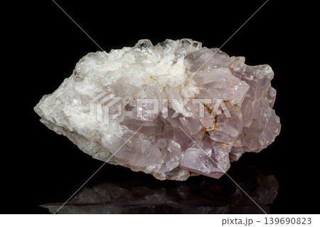 Macro mineral amethyst quartz stone on a black background Macro mineral amethyst quartz stone on a black background 139690823
