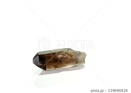 Macro mineral stone smoky quartz, rauchtopaz on a white background Macro mineral stone smoky quartz, rauchtopaz on a white background 139690826