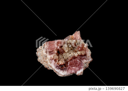 Macro mineral stone Pink Amethyst on a black background Macro mineral stone Pink Amethyst on a black background 139690827