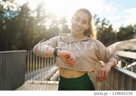 A young female athlete in special clothing is training on the court. Concept of sport, health. A young female athlete in special clothing is training on the court. Concept of sport, health. 139693250