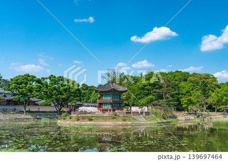 Seoul, South Korea - May. 14, 2026 : Beautiful view of Hyangwonjeong Pavilion and Chhyanggyo Bridge with pond reflection in early summer, Gyeongbokgung Palace, Seoul Seoul, South Korea - May. 14, 2026 : Beautiful view of Hyangwonjeong Pavilion and Chhyanggyo Bridge with pond reflection in early summer, Gyeongbokgung Palace, Seoul 139697464