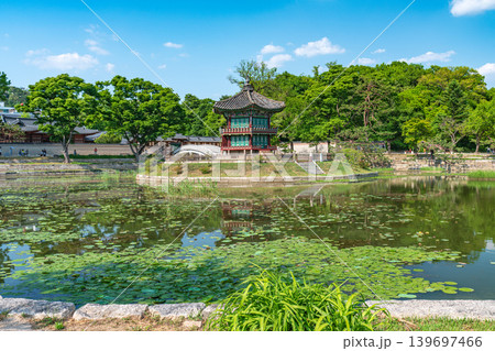 Seoul, South Korea - May. 14, 2026 : Beautiful view of Hyangwonjeong Pavilion and Chhyanggyo Bridge with pond reflection in early summer, Gyeongbokgung Palace, Seoul Seoul, South Korea - May. 14, 2026 : Beautiful view of Hyangwonjeong Pavilion and Chhyanggyo Bridge with pond reflection in early summer, Gyeongbokgung Palace, Seoul 139697466