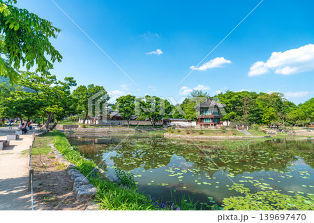 Seoul, South Korea - May. 14, 2026 : Beautiful view of Hyangwonjeong Pavilion and Chhyanggyo Bridge with pond reflection in early summer, Gyeongbokgung Palace, Seoul Seoul, South Korea - May. 14, 2026 : Beautiful view of Hyangwonjeong Pavilion and Chhyanggyo Bridge with pond reflection in early summer, Gyeongbokgung Palace, Seoul 139697470
