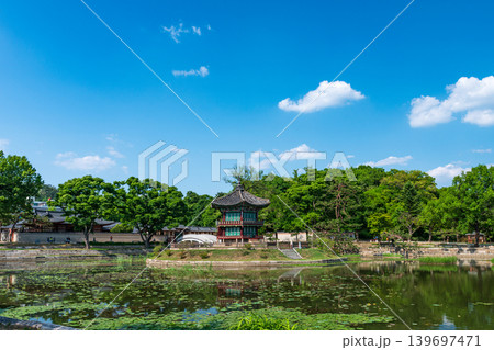 Seoul, South Korea - May. 14, 2026 : Beautiful view of Hyangwonjeong Pavilion and Chhyanggyo Bridge with pond reflection in early summer, Gyeongbokgung Palace, Seoul 139697471