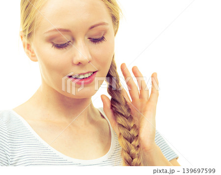 Blonde girl with braid hair Blonde girl with braid hair 139697599