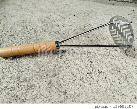 Stainless Steel Potato Masher with Wooden Handle Stainless Steel Potato Masher with Wooden Handle 139698107