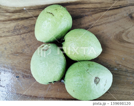 Fresh Crystal Guava close up on Wooden Table Background Fresh Crystal Guava close up on Wooden Table Background 139698120