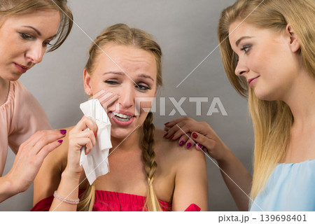 Friends helping sad woman Friends helping sad woman 139698401