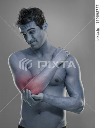 Joint pain, arm injury and man with elbow problem, medical emergency and massage tendinitis. Red glow, osteoporosis and studio person with inflammation, accident or hurt anatomy on grey background Joint pain, arm injury and man with elbow problem, medical emergency and massage tendinitis. Red glow, osteoporosis and studio person with inflammation, accident or hurt anatomy on grey background 139698775