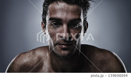 Portrait, man and water with cosmetics, sweating and dermatology on grey studio background. Face, person and model with hydration and beauty with morning routine, wet and hygiene with skincare Portrait, man and water with cosmetics, sweating and dermatology on grey studio background. Face, person and model with hydration and beauty with morning routine, wet and hygiene with skincare 139698894