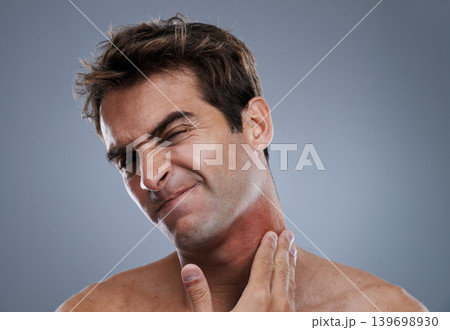 Man, shave and beard rash from razor burn on grey background for skin care fail, itchy or hair removal. Male person, neck and red pain for healthy wellness or inflammation, studio or mockup space Man, shave and beard rash from razor burn on grey background for skin care fail, itchy or hair removal. Male person, neck and red pain for healthy wellness or inflammation, studio or mockup space 139698930