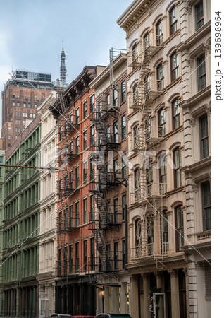 New york, usa august 18,2024. New york city historic cast iron buildings in soho showing classic architecture and metal fire escapes. Urban cityscape scene New york, usa august 18,2024. New york city historic cast iron buildings in soho showing classic architecture and metal fire escapes. Urban cityscape scene 139698964