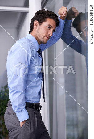 Thinking, idea and young businessman in the office planning for a corporate legal or law case. Brainstorming, problem solving and professional male attorney with question face expression in workplace Thinking, idea and young businessman in the office planning for a corporate legal or law case. Brainstorming, problem solving and professional male attorney with question face expression in workplace 139699119