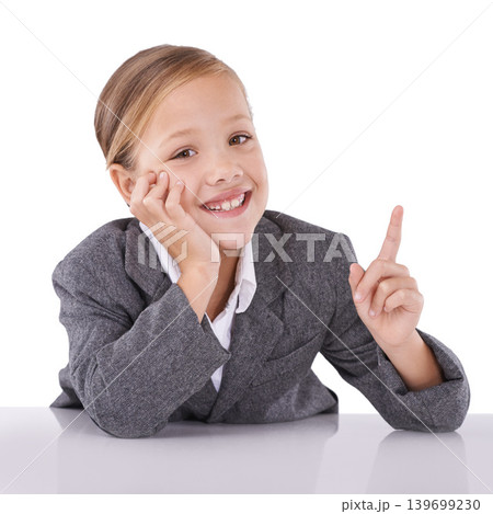 Child, portrait and business career in suit for future professional dreams, white background or studio. Kid, girl and finger for grownup idea as worker in corporate company, dress up or mockup space 139699230