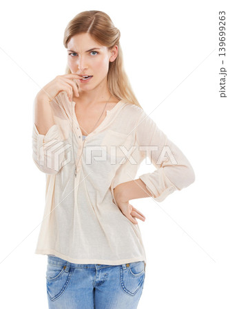 Confused, portrait and woman biting nails in studio unsure, puzzled or suspicious on white background. Doubt, face or nervous female model with hand gesture for suspense, wondering or oops expression 139699263