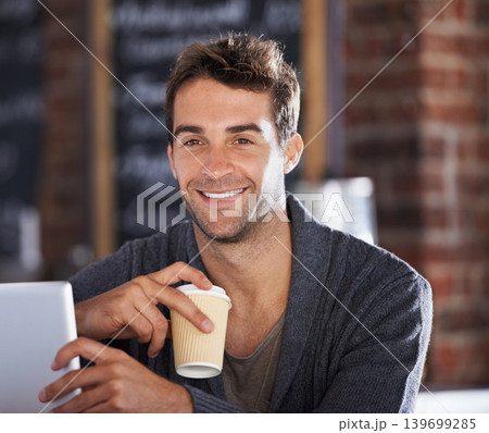 Smile, coffee and portrait of man in a cafe with tablet for networking on social media or internet. Happy, cappuccino and young male person with digital technology for research in restaurant. Smile, coffee and portrait of man in a cafe with tablet for networking on social media or internet. Happy, cappuccino and young male person with digital technology for research in restaurant. 139699285