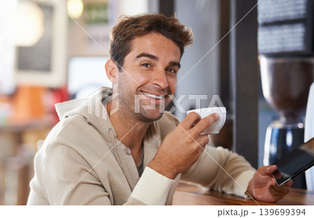 Happy, coffee and portrait of man in a cafe with tablet for networking on social media or internet. Smile, cappuccino and young male person with digital technology for research in restaurant. 139699394