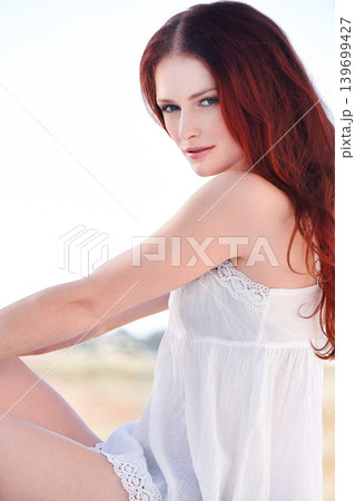 Cosmetic, nature and portrait of young woman with makeup, beauty and natural facial routine. Confidence, smile and female person with casual style or fashion and cosmetology face in park or field. Cosmetic, nature and portrait of young woman with makeup, beauty and natural facial routine. Confidence, smile and female person with casual style or fashion and cosmetology face in park or field. 139699427