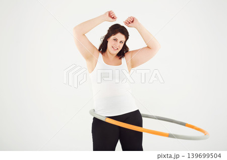 Happy woman, portrait and hoop workout in fitness, exercise or balance on a white studio background. Active female person smile with plastic circle for training, health and wellness on mockup space 139699504